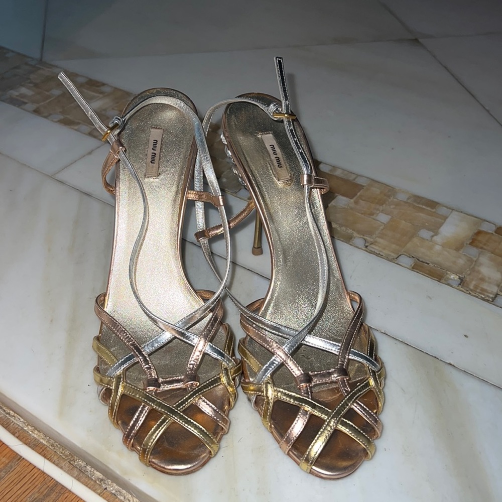 Stunning authentic Miu Miu gold, rose gold and silver stone heel